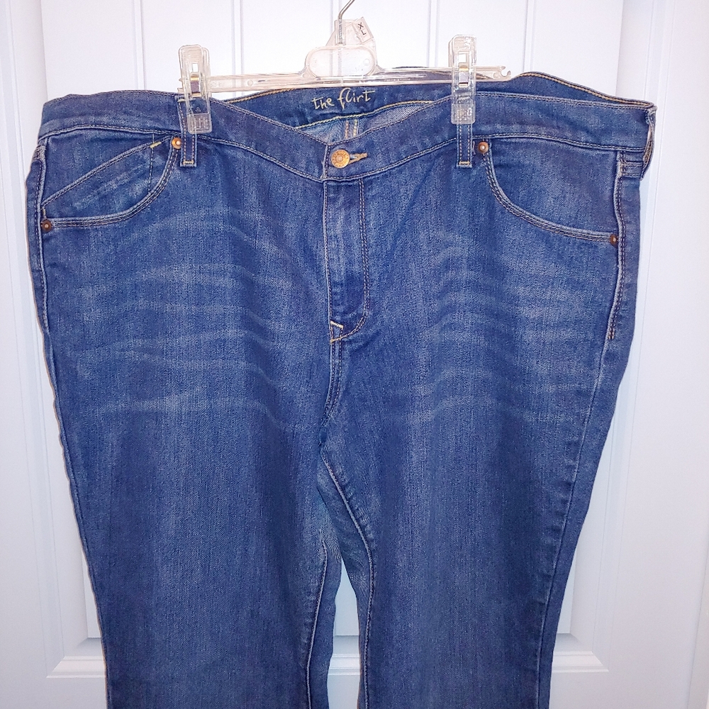 Flare jeans with partial sewn seam design on pant legs